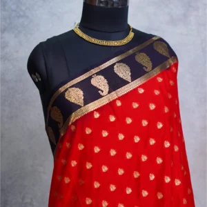 Red Mysore Crepe silk saree with golden zari buttas and deep purple floral zari border
