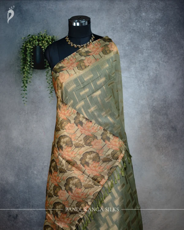 Sage Green Tissue Silk Saree with Floral Pallu & Gold Border Sage green tissue silk saree with multicolour floral pallu and antique gold border