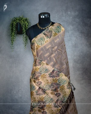 Champagne beige tissue silk saree with multicolour floral pallu, gold detailing and broad floral border