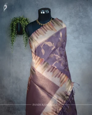 Dusty Mauve Purple Tissue Silk Saree with Antique Gold Floral Weave Dusty mauve purple tissue silk saree with antique gold floral weave and multicolour artistic border