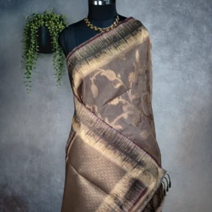 Mushroom beige tissue silk saree with antique gold floral weave and artistic multicolour border