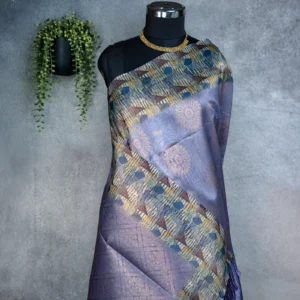 Lavender blue tissue silk saree with multicolour geometric weave, floral pallu and woven border