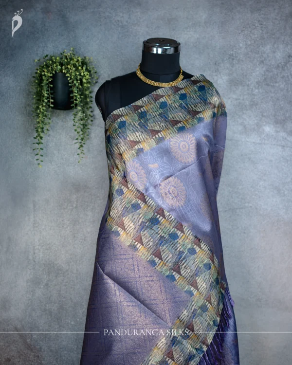 Lavender Blue Tissue Silk Saree with Multicolour Geometric Weave Lavender blue tissue silk saree with multicolour geometric weave, floral pallu and woven border