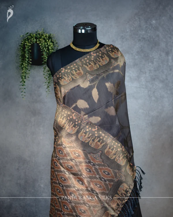 Charcoal Grey Tissue Silk Saree with Antique Gold Elephant Motif Border Charcoal grey tissue silk saree with antique gold elephant motif border and floral zari weave