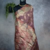 Dusty mauve tissue silk saree with floral leaf weave, antique gold details, broad border and multicolour pallu