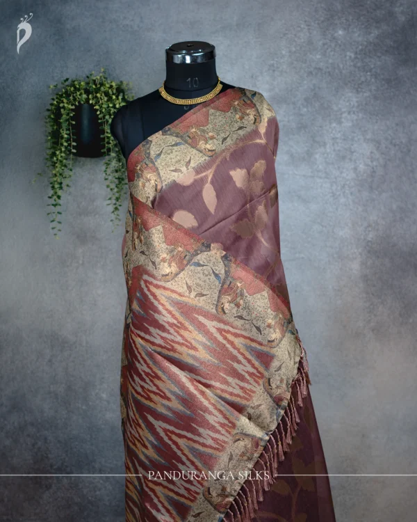 Dusty mauve tissue silk saree with floral leaf weave, antique gold details, broad border and multicolour pallu