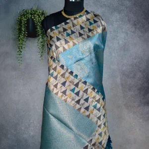Sky blue tissue silk saree with multicolour geometric border, golden floral pallu and tassels