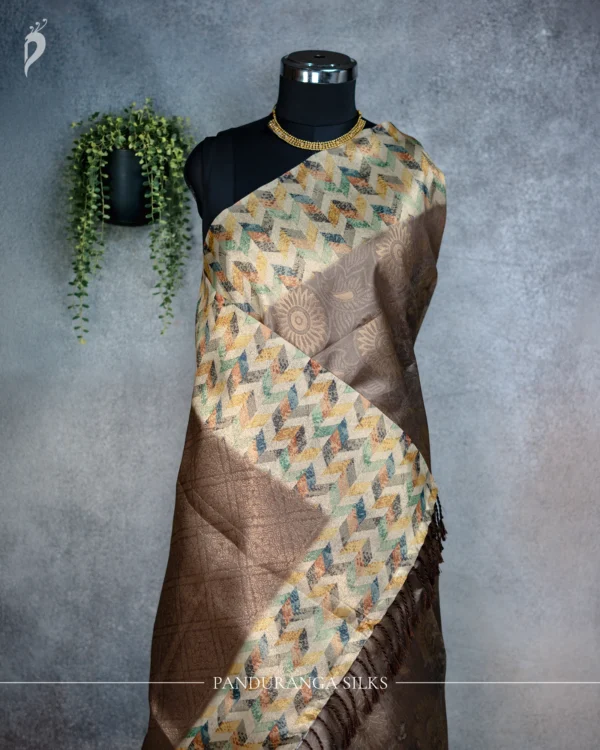 Beige Tissue Silk Saree with Multicolour Geometric Woven Border Beige tissue silk saree with multicolour geometric woven border and brownish-lavender pallu