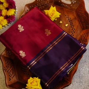 Dusty mauve Gadwal silk saree with gold zari buttas, navy gap border and geometric zari pallu