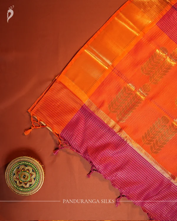 Rani Pink Silk Saree with Zari Checks and Golden Pineapple Buttas Pink magenta silk saree with golden zari checks, floral motifs and rich zari border – Panduranga Silks
