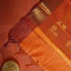 Burnt Orange Silk Saree with Zari Checks and Pineapple Buttas Burnt orange silk saree with zari checks, pineapple buttas, rich golden zari border and traditional pallu.