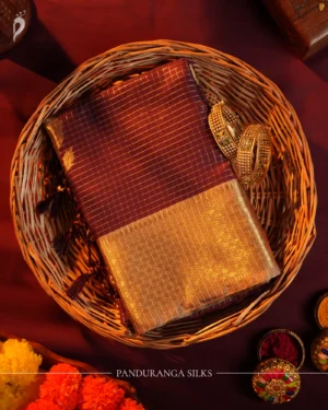 Deep coffee brown silk saree with golden zari checks, pineapple motifs and woven zari border