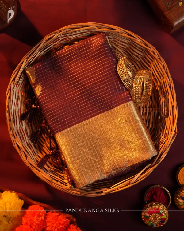 Deep Coffee Brown Silk Saree with Zari Checks and Golden Buttas Deep coffee brown silk saree with golden zari checks, pineapple motifs and woven zari border
