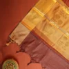Deep Coffee Brown Silk Saree with Zari Checks and Golden Buttas Deep coffee brown silk saree with golden zari checks, pineapple motifs and woven zari border