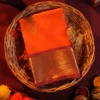 Orange Silk Saree with Zari Checks and Golden Pineapple Buttas Orange silk saree with golden zari checks, pineapple motifs and woven zari border