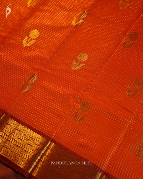 Orange Silk Saree with Zari Checks and Golden Pineapple Buttas Orange silk saree with golden zari checks, pineapple motifs and woven zari border