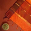Orange Silk Saree with Zari Checks and Golden Pineapple Buttas Orange silk saree with golden zari checks, pineapple motifs and woven zari border