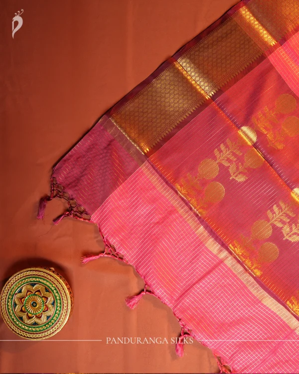 Plum Purple Silk Saree with Zari Checks and Golden Pineapple Buttas Plum purple silk saree with copper zari checks, golden pineapple motifs and geometric zari border