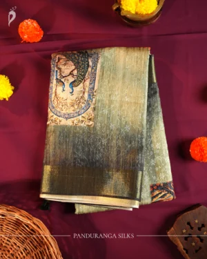 Pistachio Green Silk Saree with Mughal Inspired Floral Emboss Work Pistachio green silk saree with Mughal-inspired printed panels, floral emboss work and subtle zari border