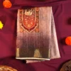 Mauve Pink Silk Saree with Mughal Inspired Floral Emboss Work Mauve pink silk saree with Mughal-inspired prints, floral motifs, multicolour panels and subtle zari border