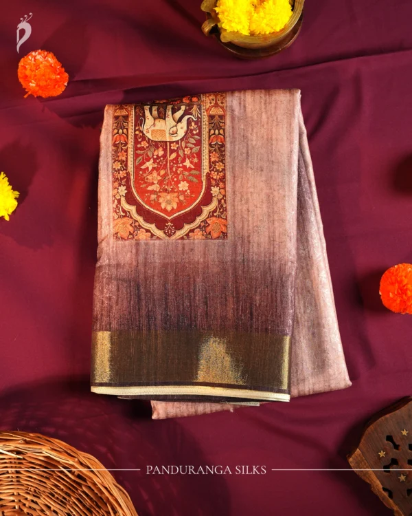 Mauve Pink Silk Saree with Mughal Inspired Floral Emboss Work Mauve pink silk saree with Mughal-inspired prints, floral motifs, multicolour panels and subtle zari border