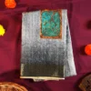 Powder Blue Silk Saree with Mughal Inspired Floral Emboss Work Powder blue silk saree with Mughal-inspired printed panels, floral emboss work and subtle zari border