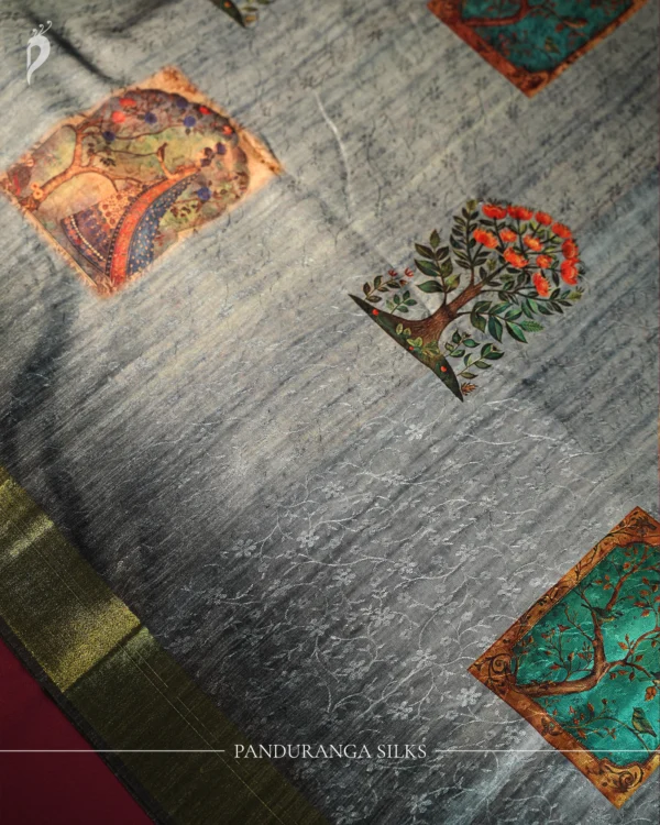 Powder Blue Silk Saree with Mughal Inspired Floral Emboss Work Powder blue silk saree with Mughal-inspired printed panels, floral emboss work and subtle zari border