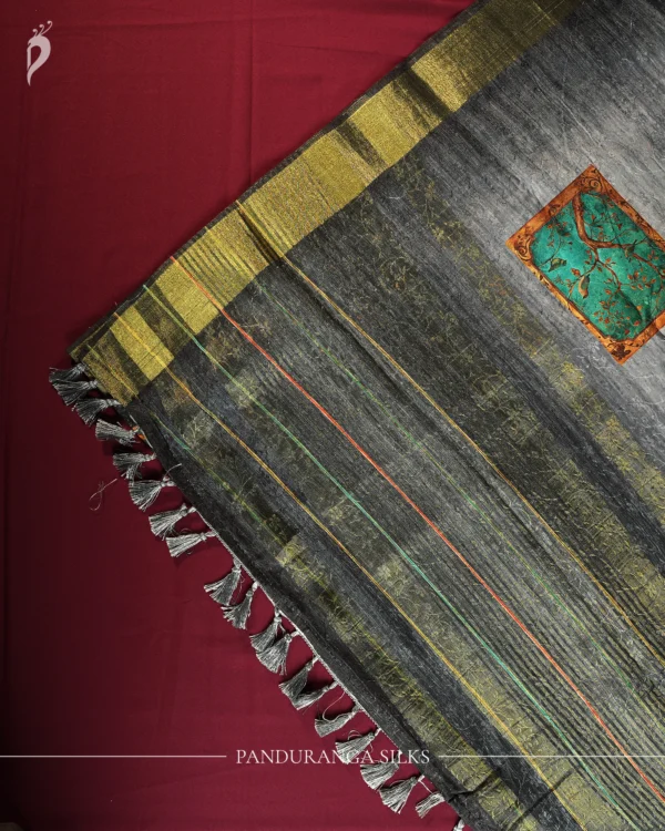 Powder Blue Silk Saree with Mughal Inspired Floral Emboss Work Powder blue silk saree with Mughal-inspired printed panels, floral emboss work and subtle zari border