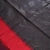 Charcoal Black Raw Silk Saree with Checked Design and Maroon Border Charcoal black raw silk saree with zari checks, maroon temple-work border, contrast pallu and tassels