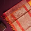 Mustard Yellow Raw Silk Saree with Checks and Wine Maroon Border Mustard yellow raw silk saree with zari checks, wine maroon temple border and contrasting zari-woven pallu