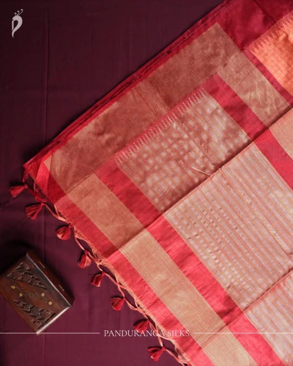 Coral Orange Raw Silk Saree with Checks and Deep Maroon Border Coral orange raw silk saree with zari checks, deep maroon temple border and contrasting zari-woven pallu