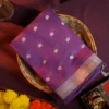 Rani Purple Soft Silk Cotton Saree with Golden Zari Buttas Rani purple silk cotton saree with golden zari buttas and silver grey pallu