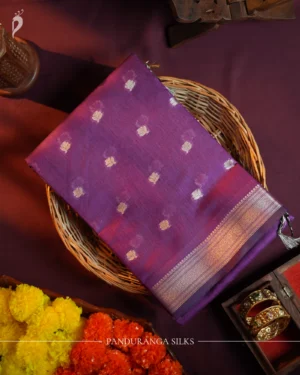 Rani purple silk cotton saree with golden zari buttas and silver grey pallu