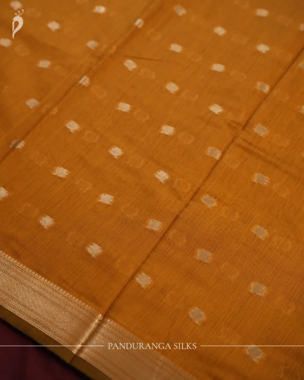 Mustard Gold Soft Silk Cotton Saree with Golden Zari Buttas Mustard gold silk cotton saree with golden zari buttas and sage grey pallu