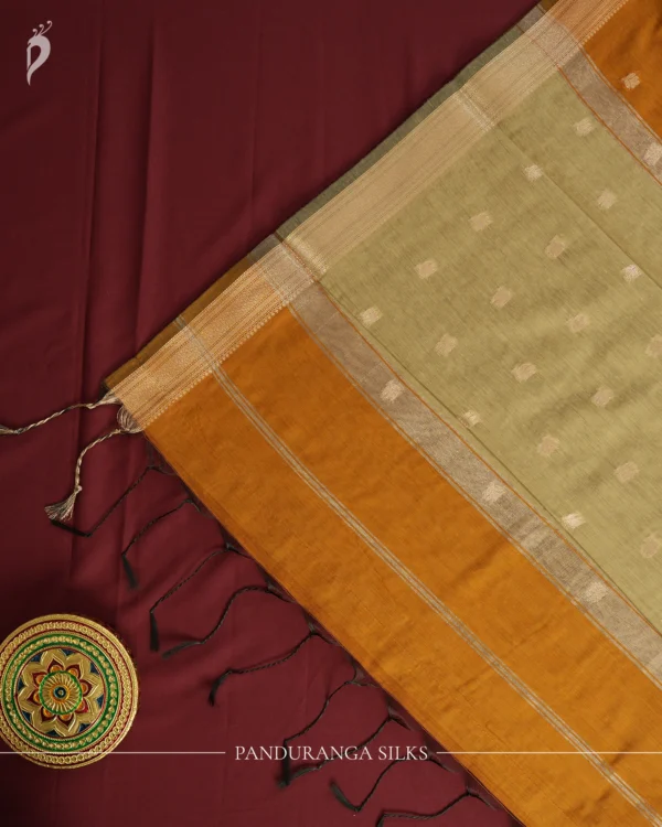 Mustard Gold Soft Silk Cotton Saree with Golden Zari Buttas Mustard gold silk cotton saree with golden zari buttas and sage grey pallu