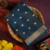 Navy Blue Soft Silk Cotton Saree with Golden Zari Buttas Navy blue silk cotton saree with golden zari buttas and sage grey pallu