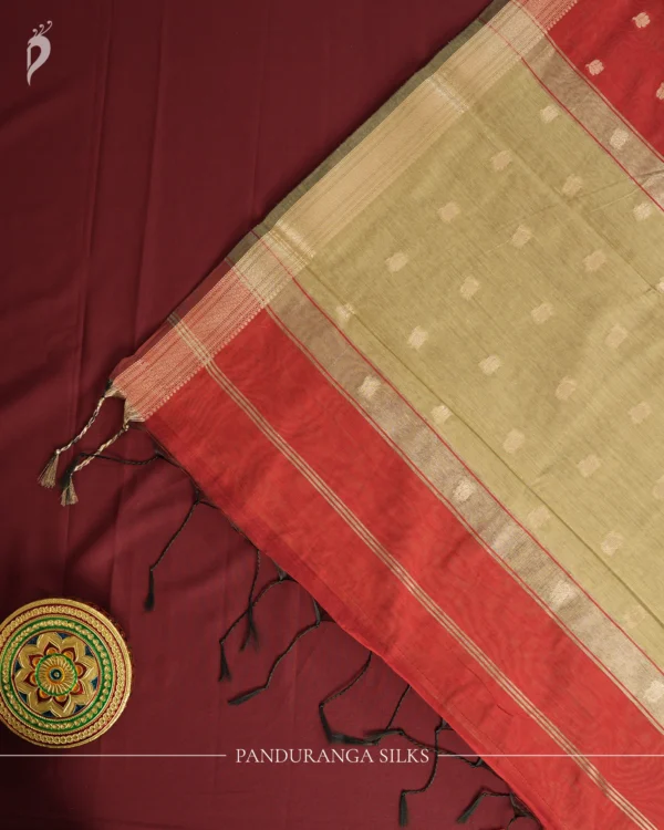 Maroon Soft Silk Cotton Saree with Golden Zari Buttas Maroon silk cotton saree with golden zari buttas and sage grey pallu