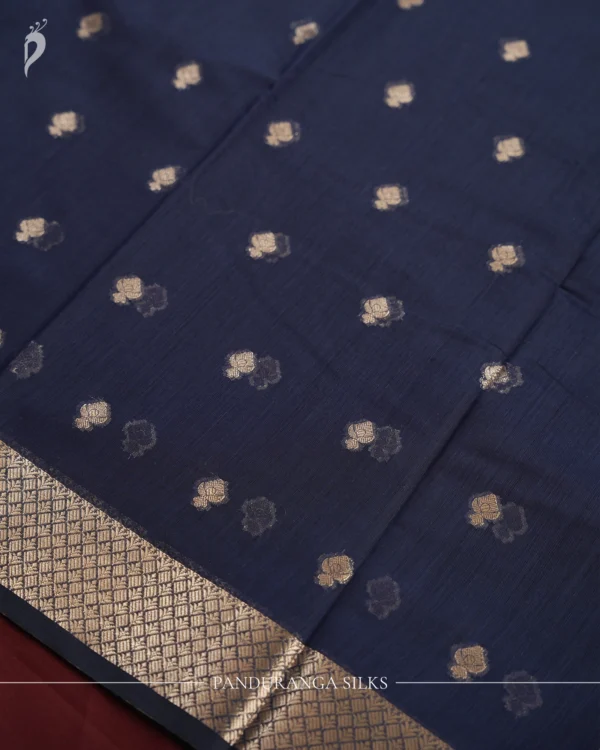 Navy Blue Soft Silk Cotton Saree with Golden Zari Buttas Navy blue silk cotton saree with golden zari buttas and sage grey pallu