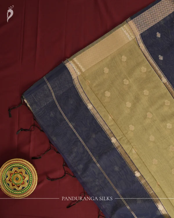 Navy Blue Soft Silk Cotton Saree with Golden Zari Buttas Navy blue silk cotton saree with golden zari buttas and sage grey pallu