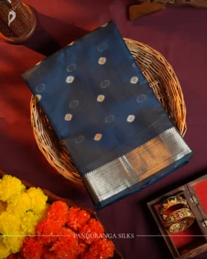 Navy Blue Soft Silk Cotton Saree with Beautiful Golden Zari Buttas Navy blue silk cotton saree with golden zari buttas and sage grey pallu and blouse