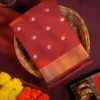 Maroon Soft Silk Cotton Saree with Beautiful Golden Zari Buttas Maroon silk cotton saree with golden zari buttas and sage grey pallu and blouse