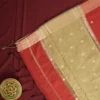 Maroon Soft Silk Cotton Saree with Beautiful Golden Zari Buttas Maroon silk cotton saree with golden zari buttas and sage grey pallu and blouse