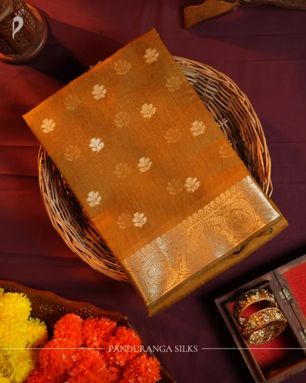 Mustard Gold Soft Silk Cotton Saree with Beautiful Golden Zari Buttas Mustard gold silk cotton saree with golden flower buttas and detailed zari border