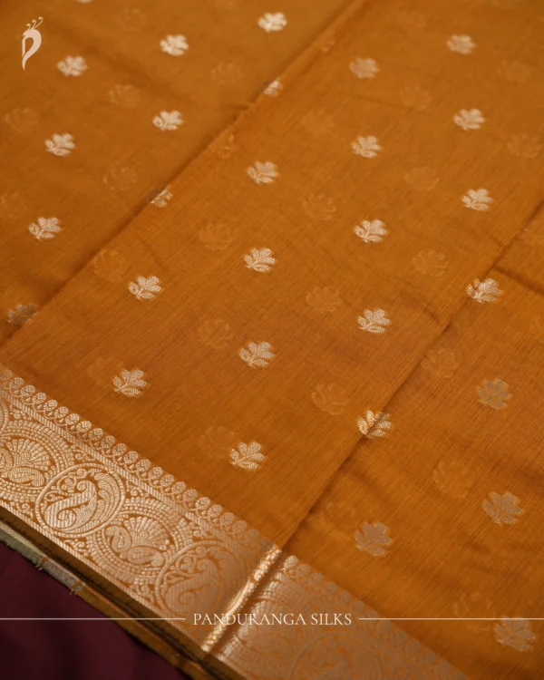 Mustard Gold Soft Silk Cotton Saree with Beautiful Golden Zari Buttas Mustard gold silk cotton saree with golden flower buttas and detailed zari border