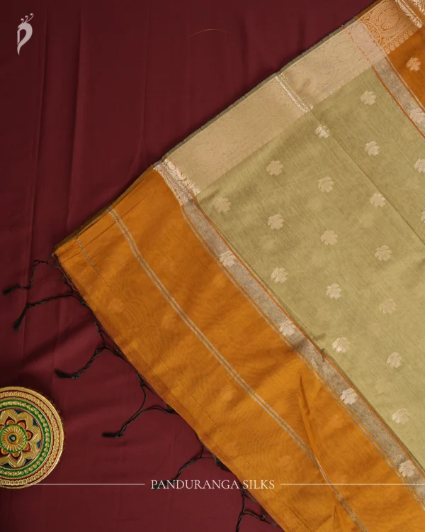Mustard Gold Soft Silk Cotton Saree with Beautiful Golden Zari Buttas Mustard gold silk cotton saree with golden flower buttas and detailed zari border