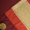 Red silk cotton saree with golden zari buttas and sage grey pallu and blouse