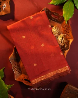 Red Soft Silk Cotton Saree with Golden Zari Buttas and Navy Blue Pallu Red silk cotton saree with golden zari buttas, golden border and navy blue pallu