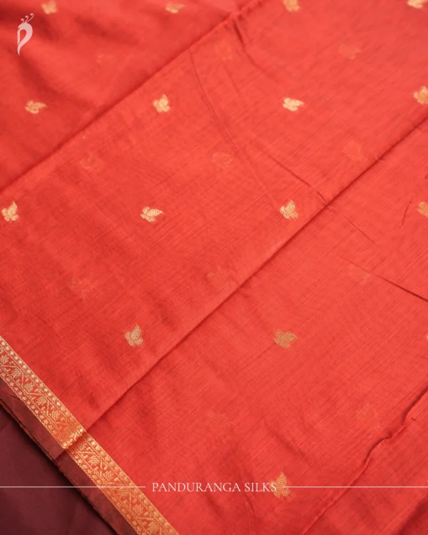 Red Soft Silk Cotton Saree with Golden Zari Buttas and Navy Blue Pallu Red silk cotton saree with golden zari buttas, golden border and navy blue pallu