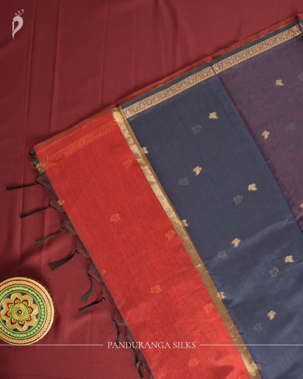 Red Soft Silk Cotton Saree with Golden Zari Buttas and Navy Blue Pallu Red silk cotton saree with golden zari buttas, golden border and navy blue pallu