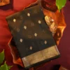 Black Soft Silk Cotton Saree with Golden Zari Buttas and Border Black silk cotton saree with golden zari buttas and geometric zari border
